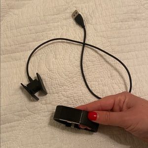 Fitbit watch with charger